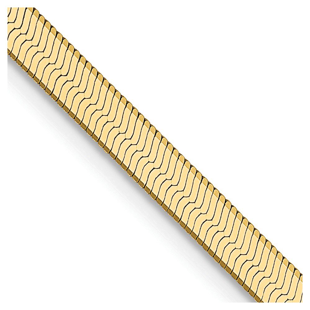 Gold bracelet with wavy line pattern.