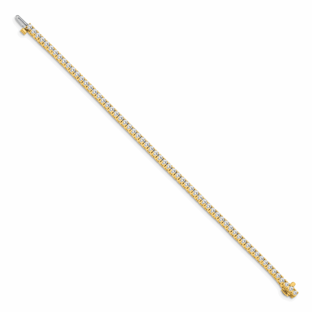 Gold and diamond tennis bracelet.