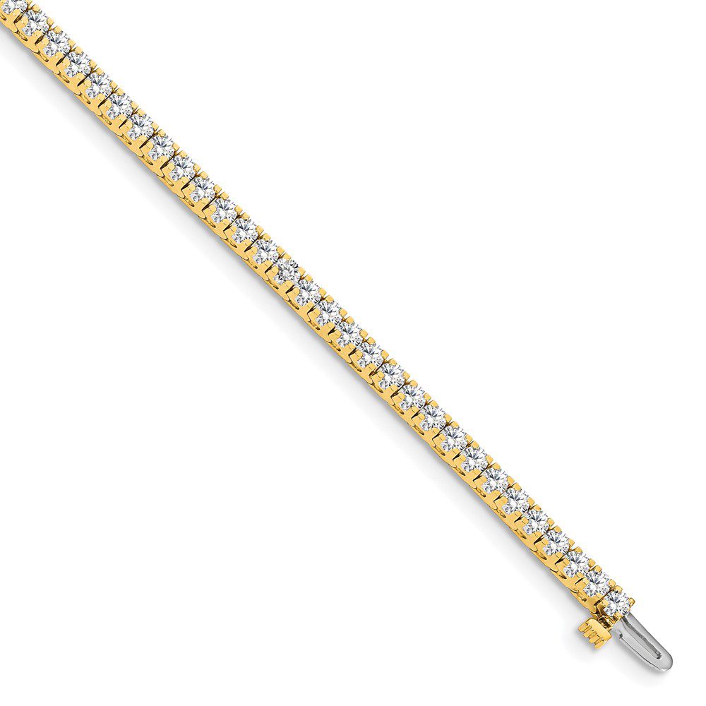 Gold and diamond tennis bracelet.
