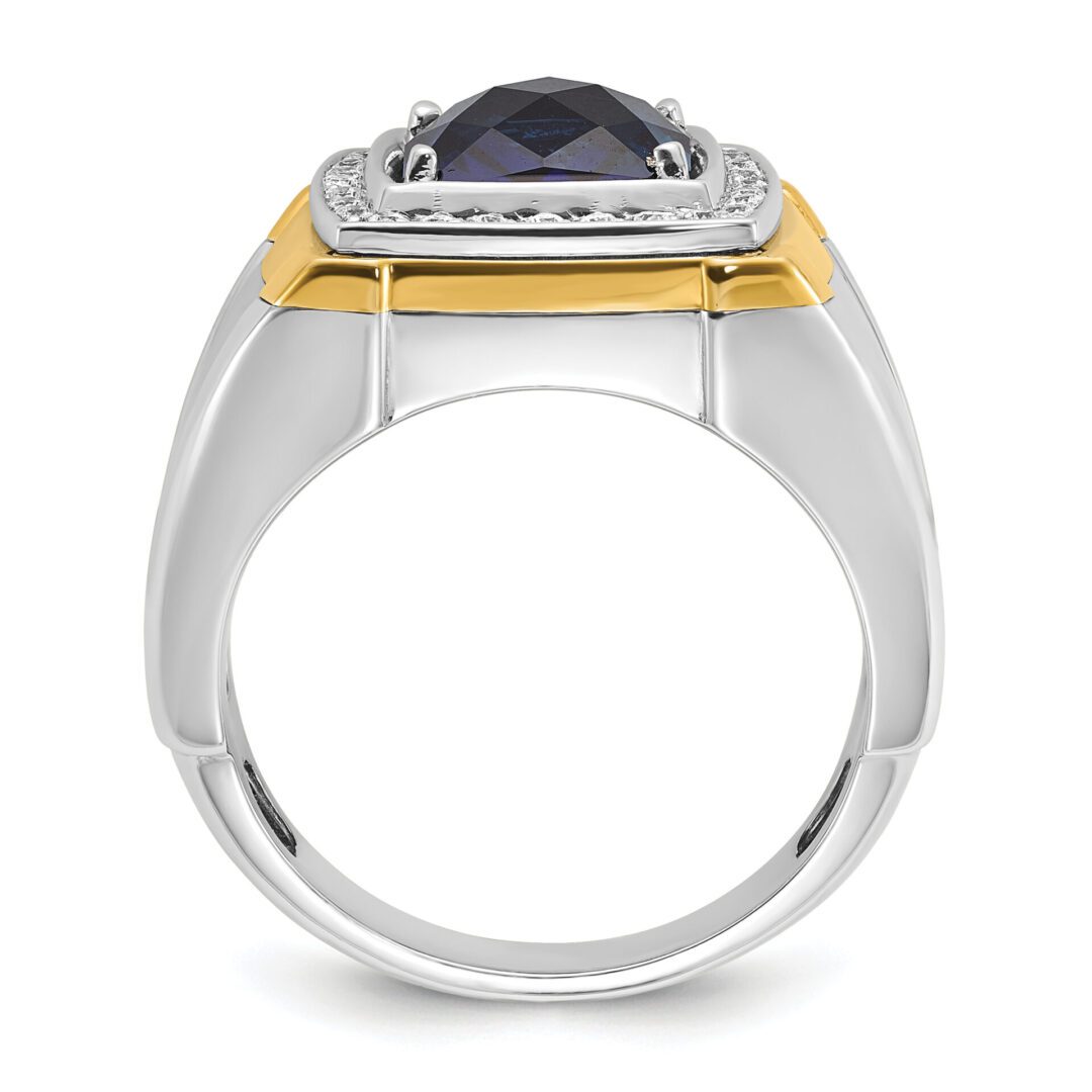Elegant silver ring with a dark gemstone and gold accents.