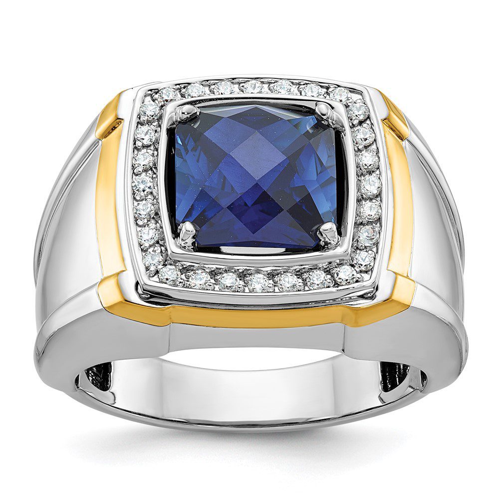 Silver ring with a blue gemstone and diamond accents.