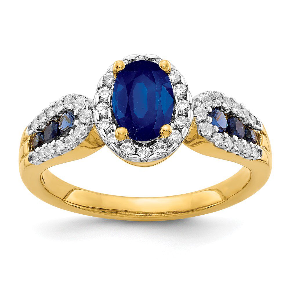Elegant gold ring with blue sapphires and diamonds.