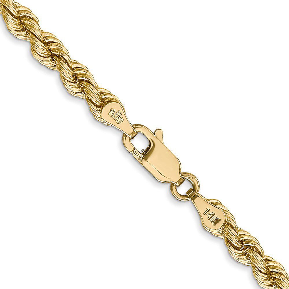 Close-up of a gold rope chain bracelet with a lobster clasp.