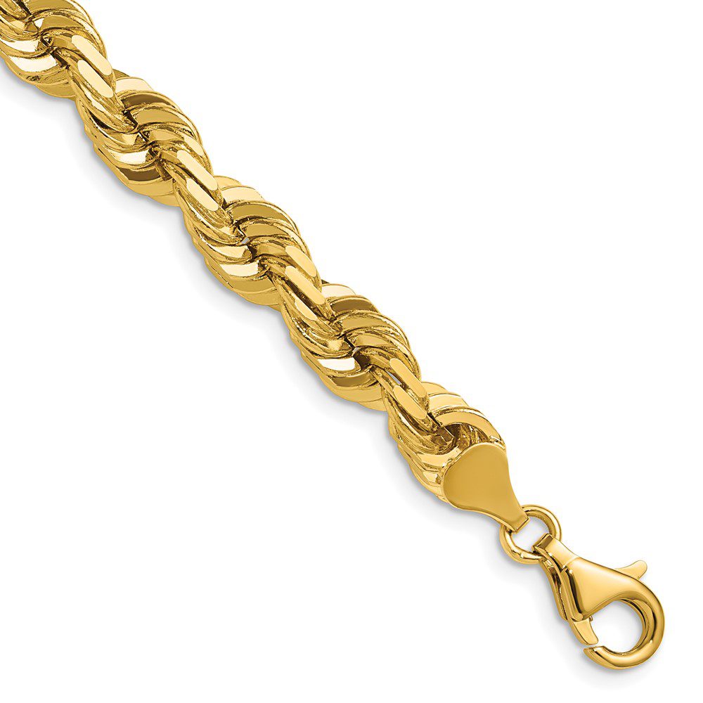 Close-up of a gold chain bracelet with a lobster clasp.