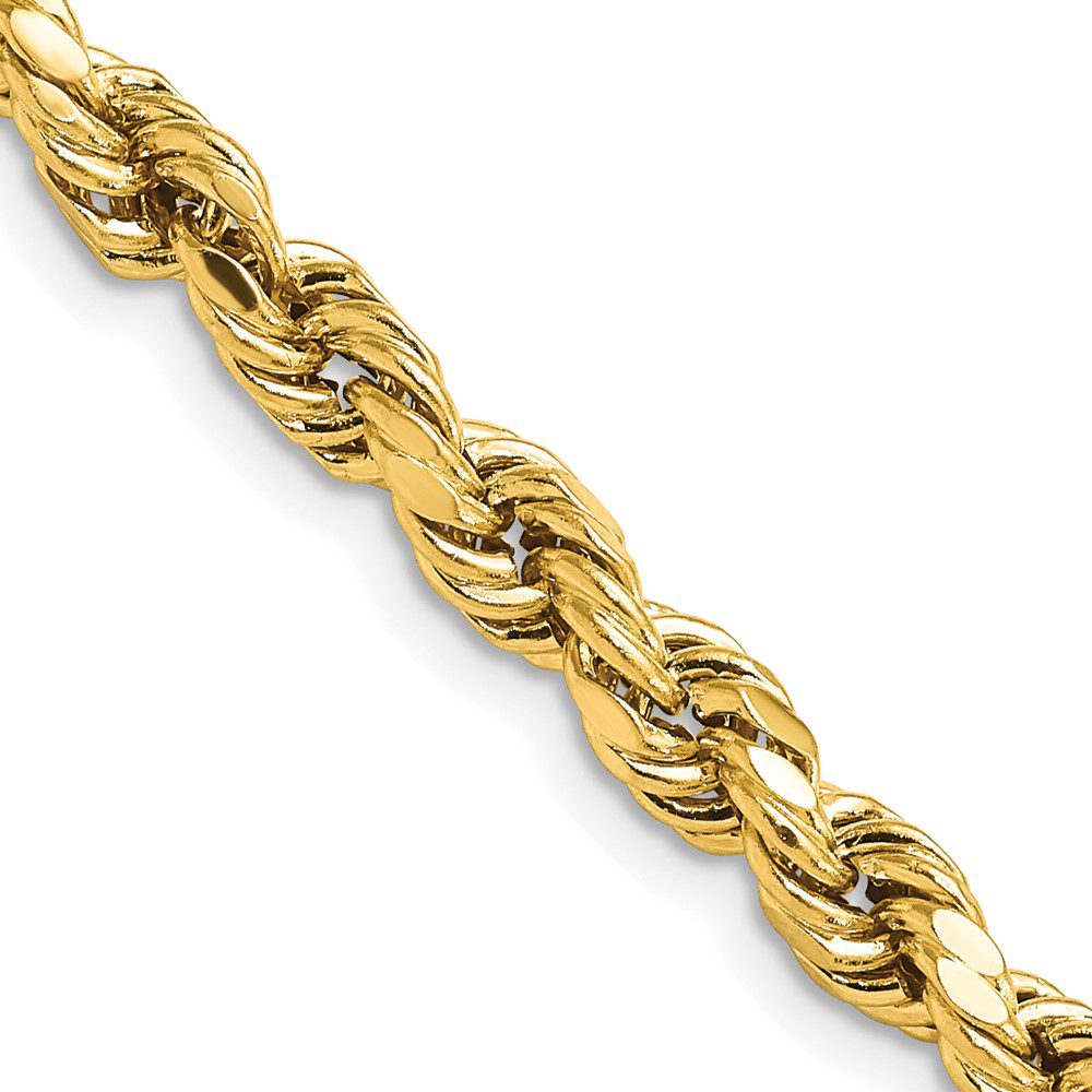 Close-up of a gold rope chain necklace.