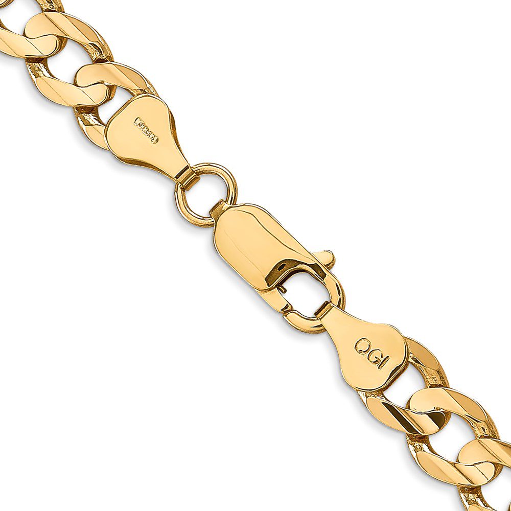 Close-up of a gold chain bracelet with a lobster clasp.