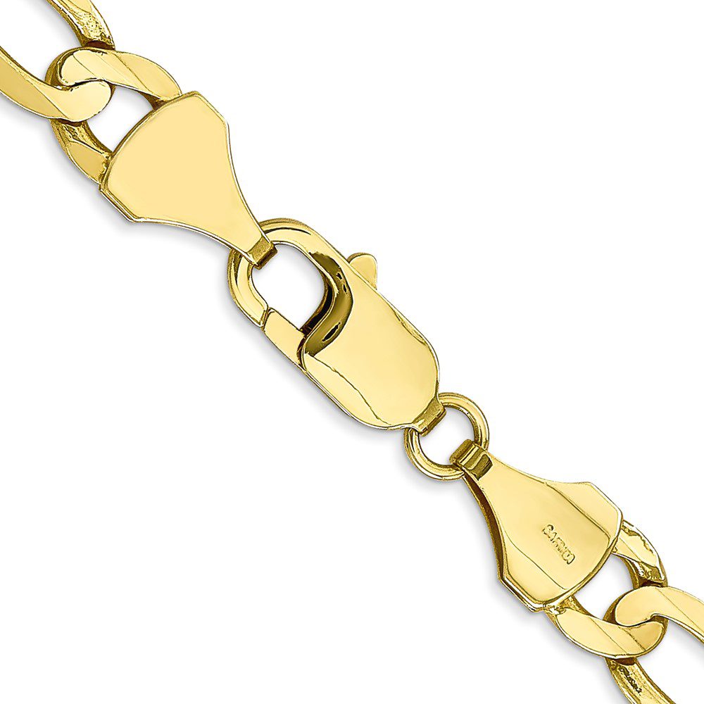 Close-up of a gold bracelet with a polished clasp.