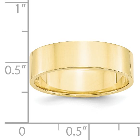 A simple gold wedding band with measurement scale.