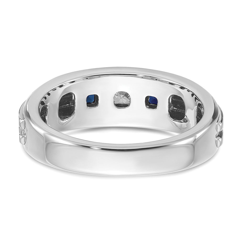 A silver ring with evenly spaced dark blue stones embedded.