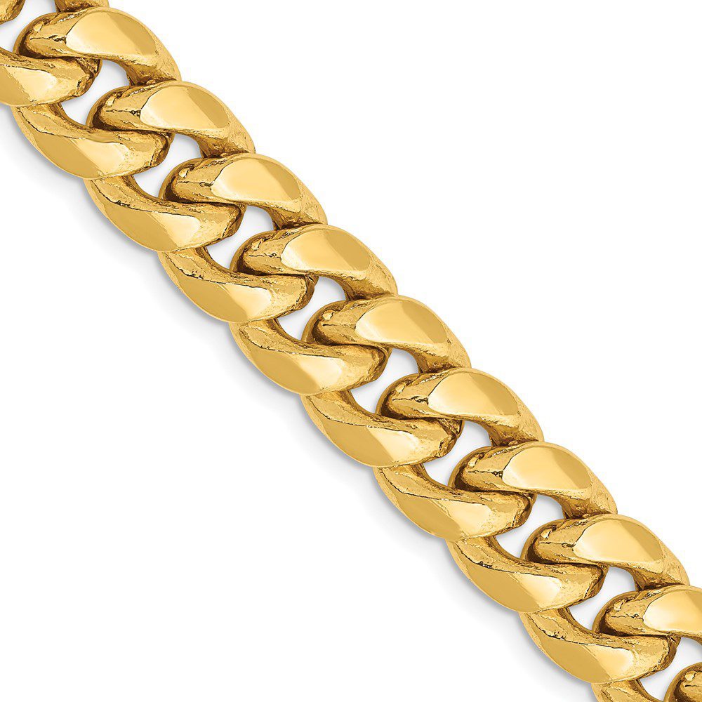 Close-up of a gold chain necklace with interlocking links.