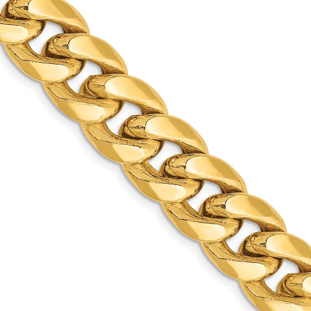 Close-up of a gold chain necklace with interlocking links.