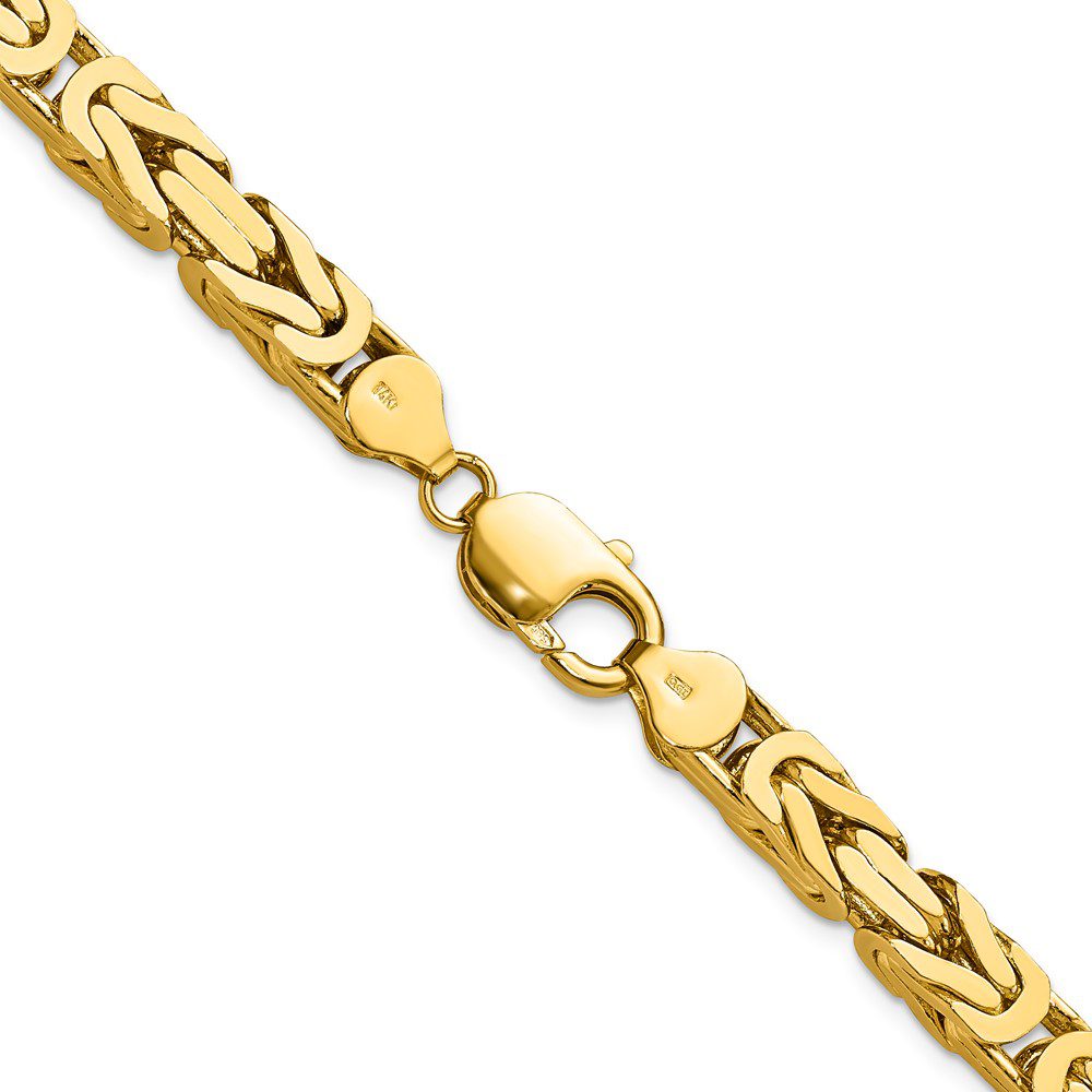 Elegant gold chain bracelet with intricate links and a lobster clasp.
