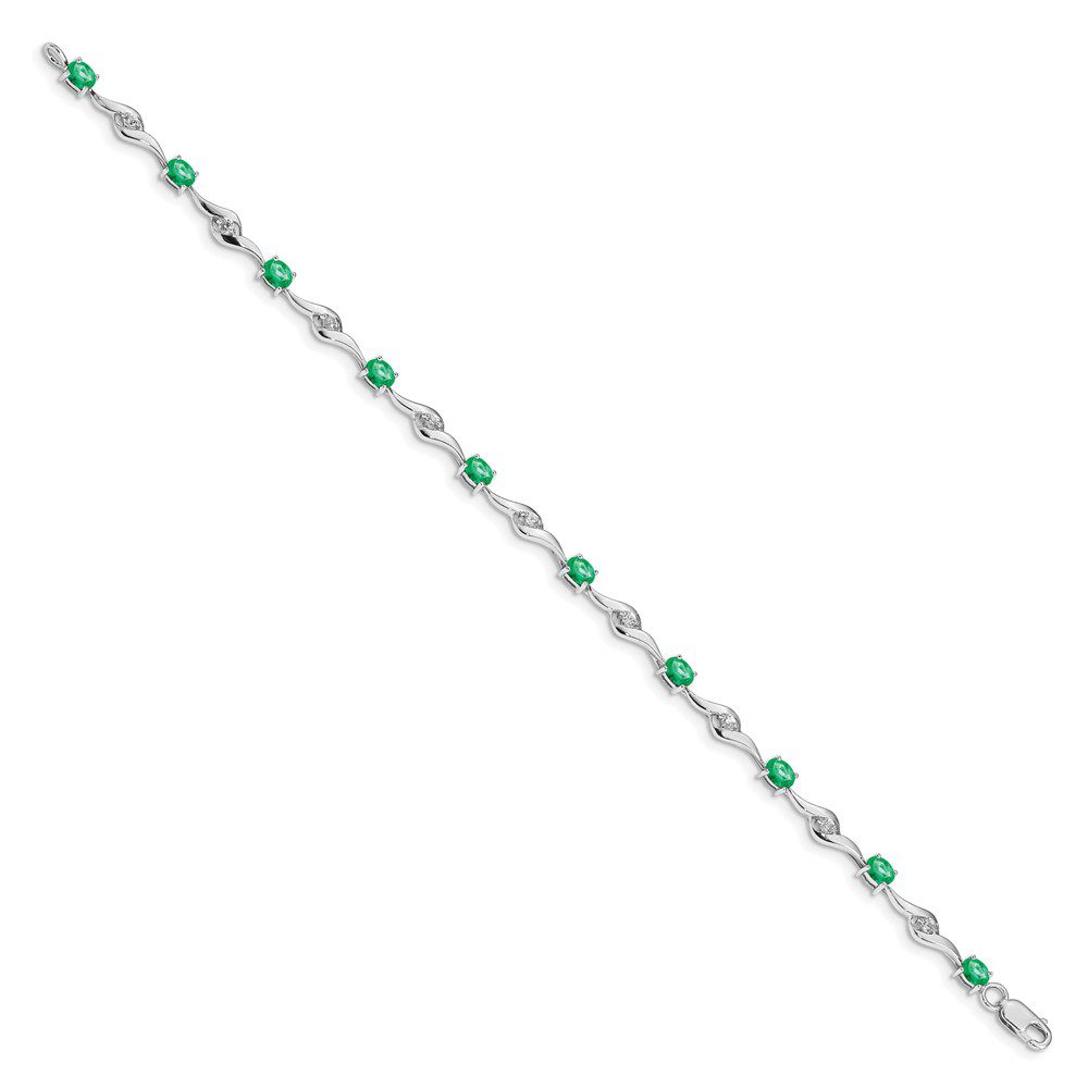 Elegant silver bracelet with green gemstone accents.