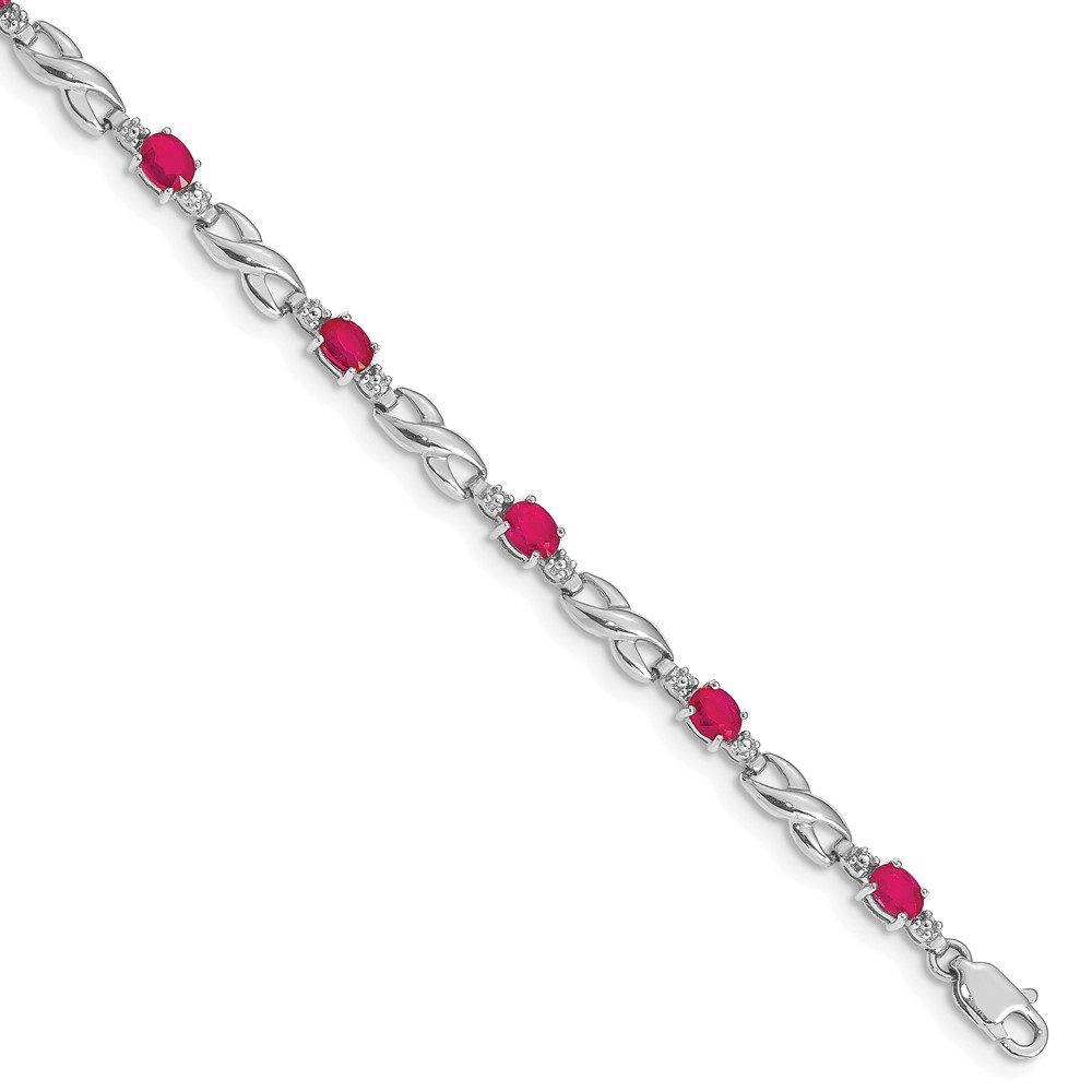 Elegant silver bracelet with alternating red and clear gemstones.