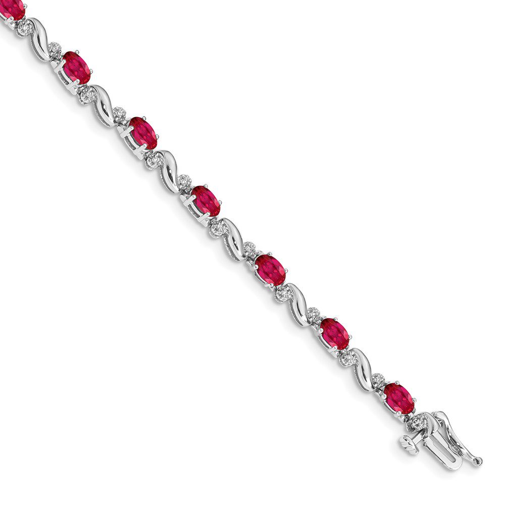 Silver bracelet with oval red gemstones linked by small silver connectors.