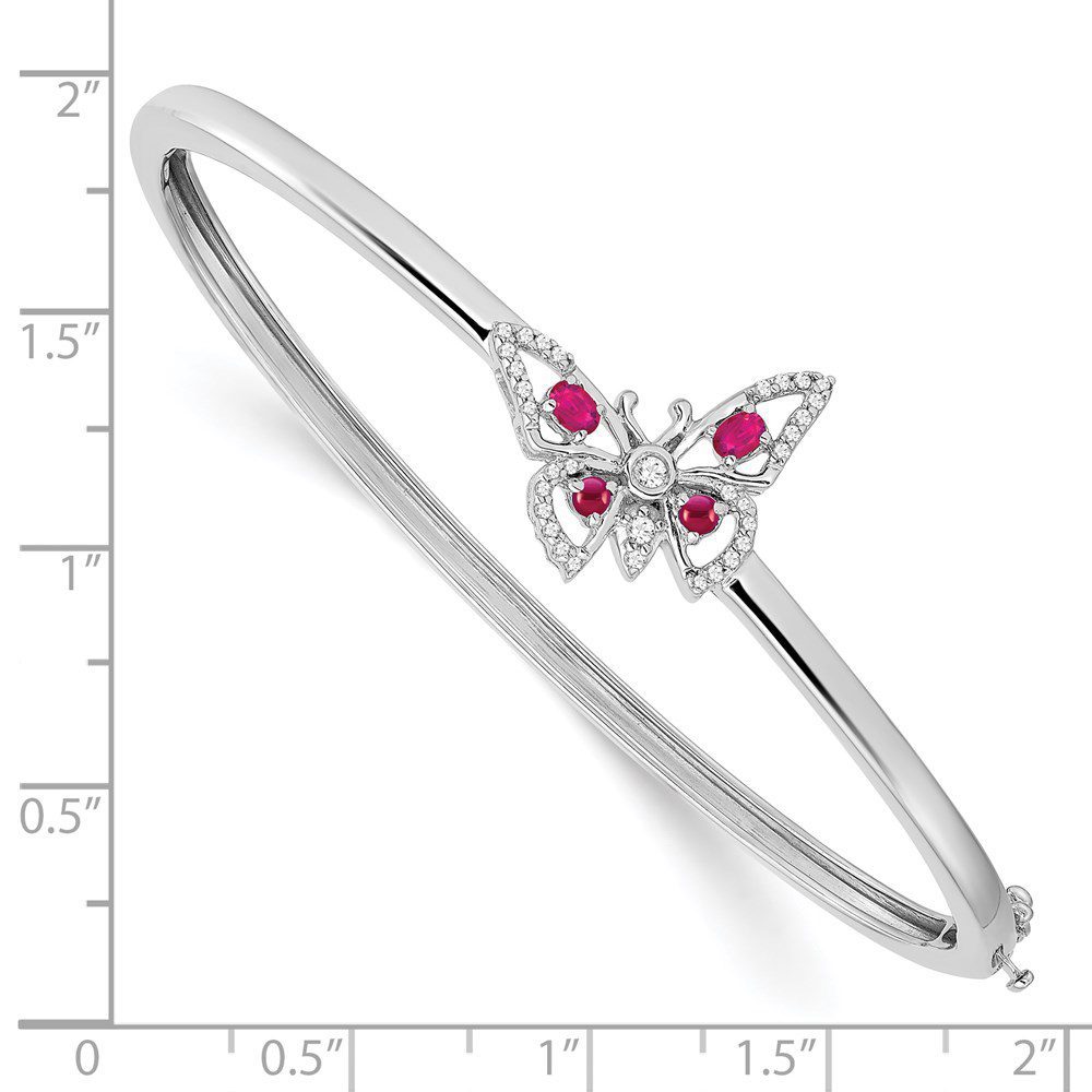 Elegant silver butterfly bracelet adorned with pink gemstones.
