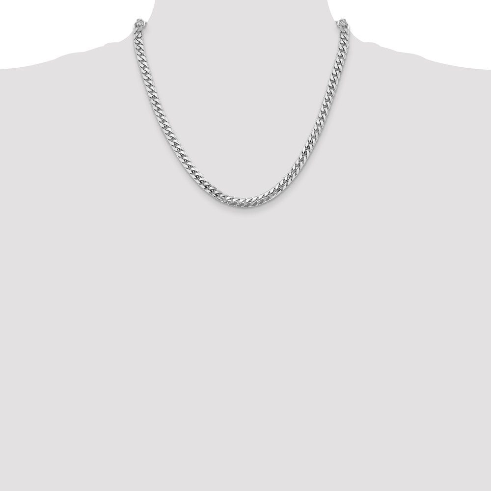 Simple silver chain necklace displayed on a gray background.