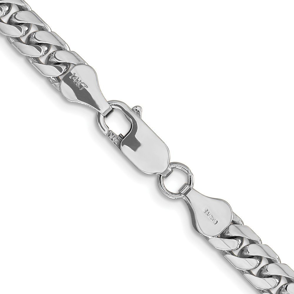 Close-up of a silver chain bracelet with a lobster clasp.