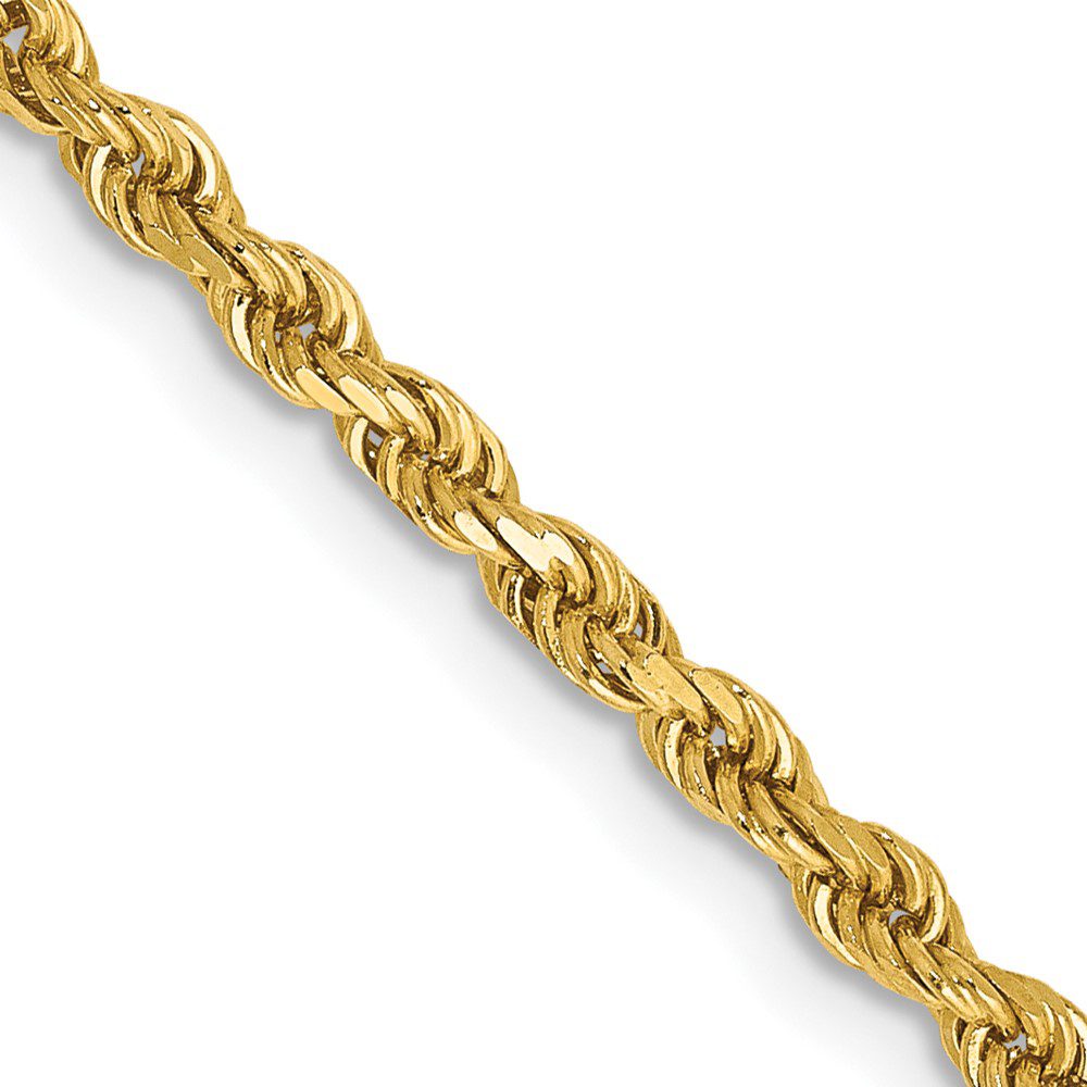 Close-up of a twisted gold chain necklace.