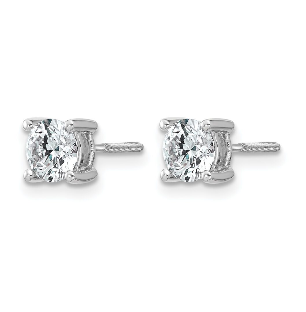 Elegant diamond stud earrings with silver settings.