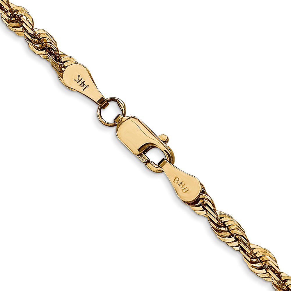 Close-up of a gold chain necklace with intricate links and a secure clasp.