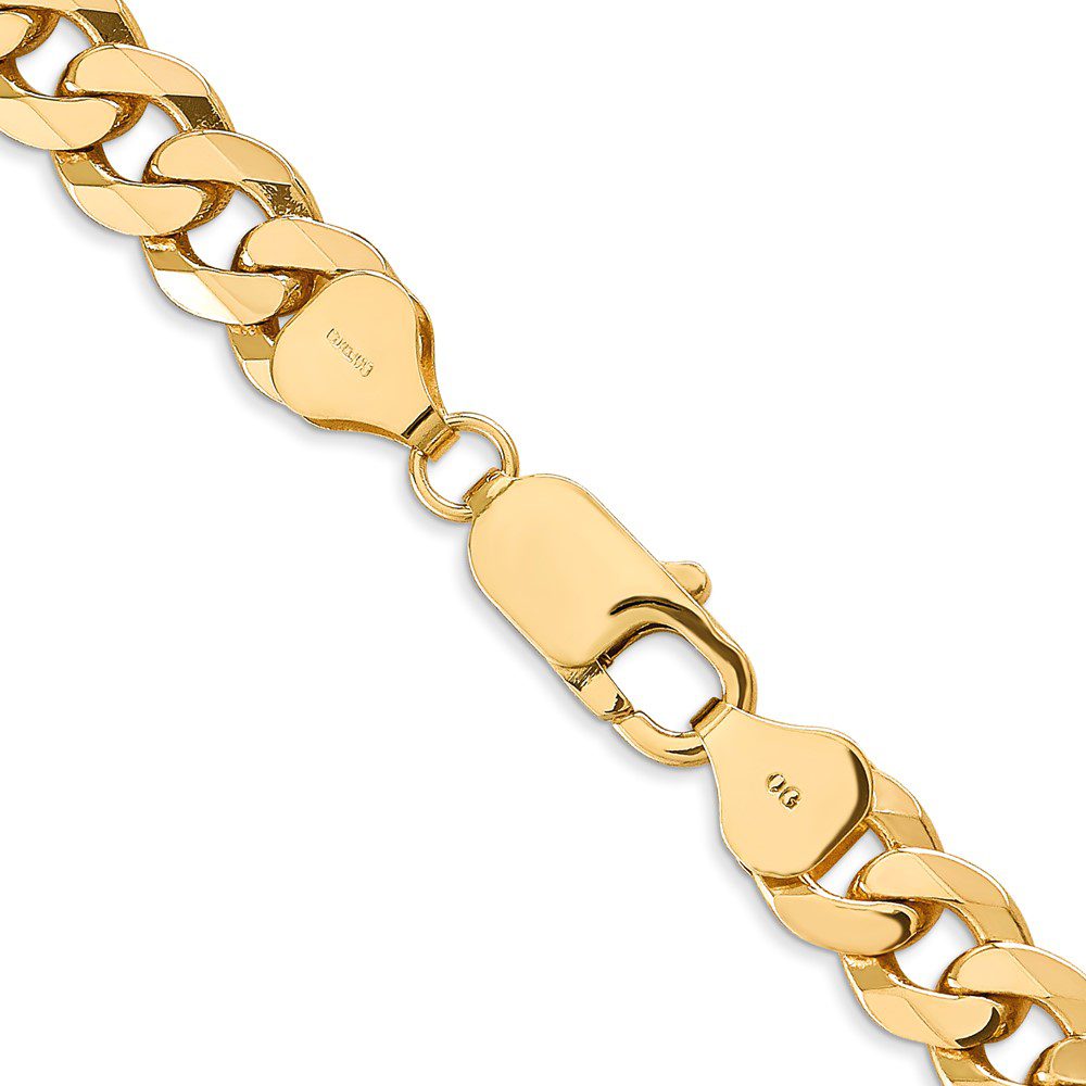 Close-up of a gold link bracelet with a clasp.