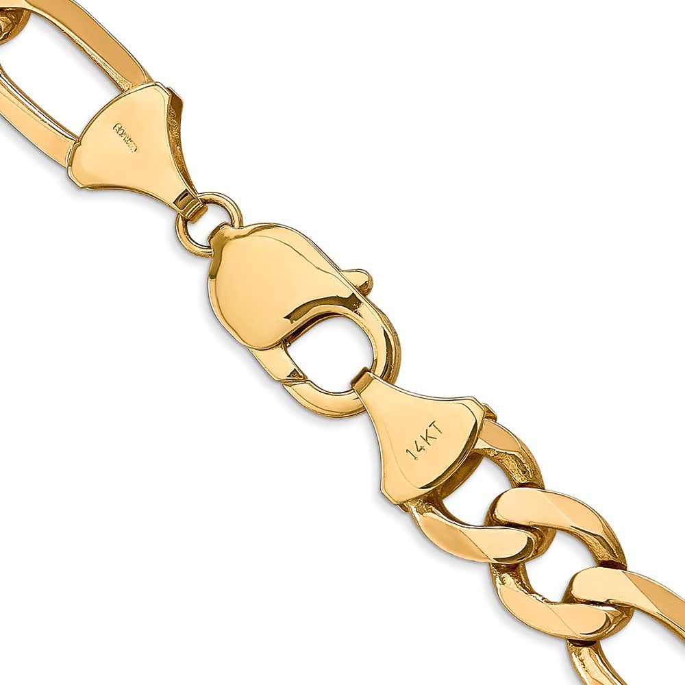 Close-up of a gold chain bracelet clasp.