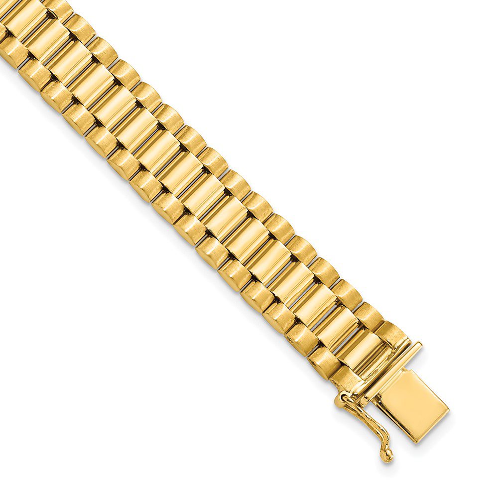 Close-up of a gold metal watch band with a clasp.