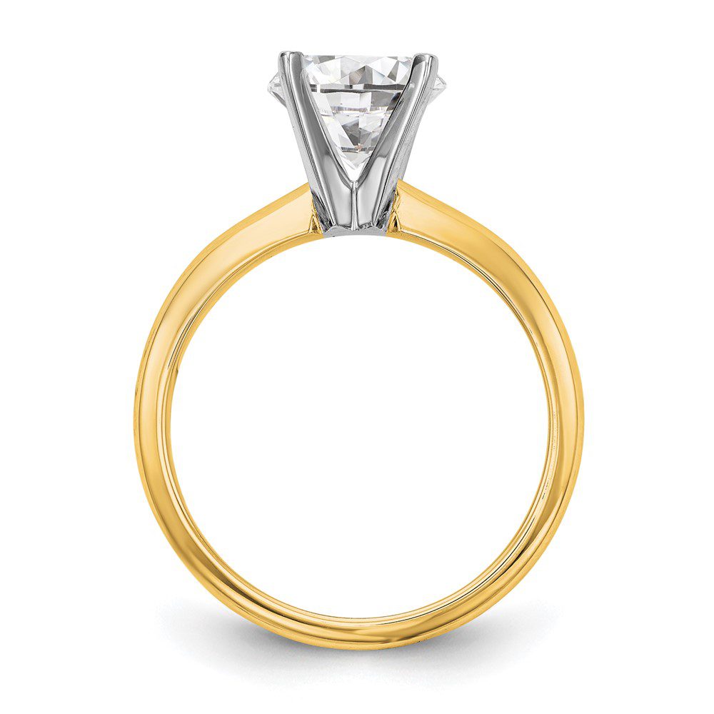 Elegant gold ring with a solitaire diamond.