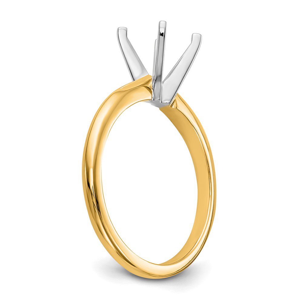 Elegant gold ring setting with prongs, ready for a gemstone.