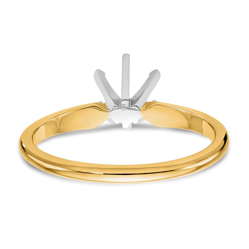Elegant gold ring with a three-prong setting for a gemstone.