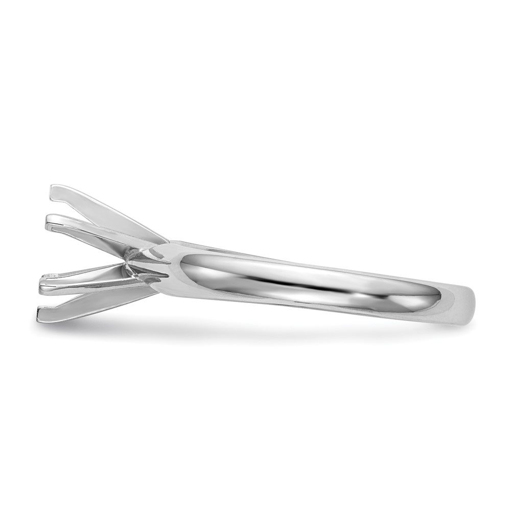 Simple silver ring band with a four-prong setting.