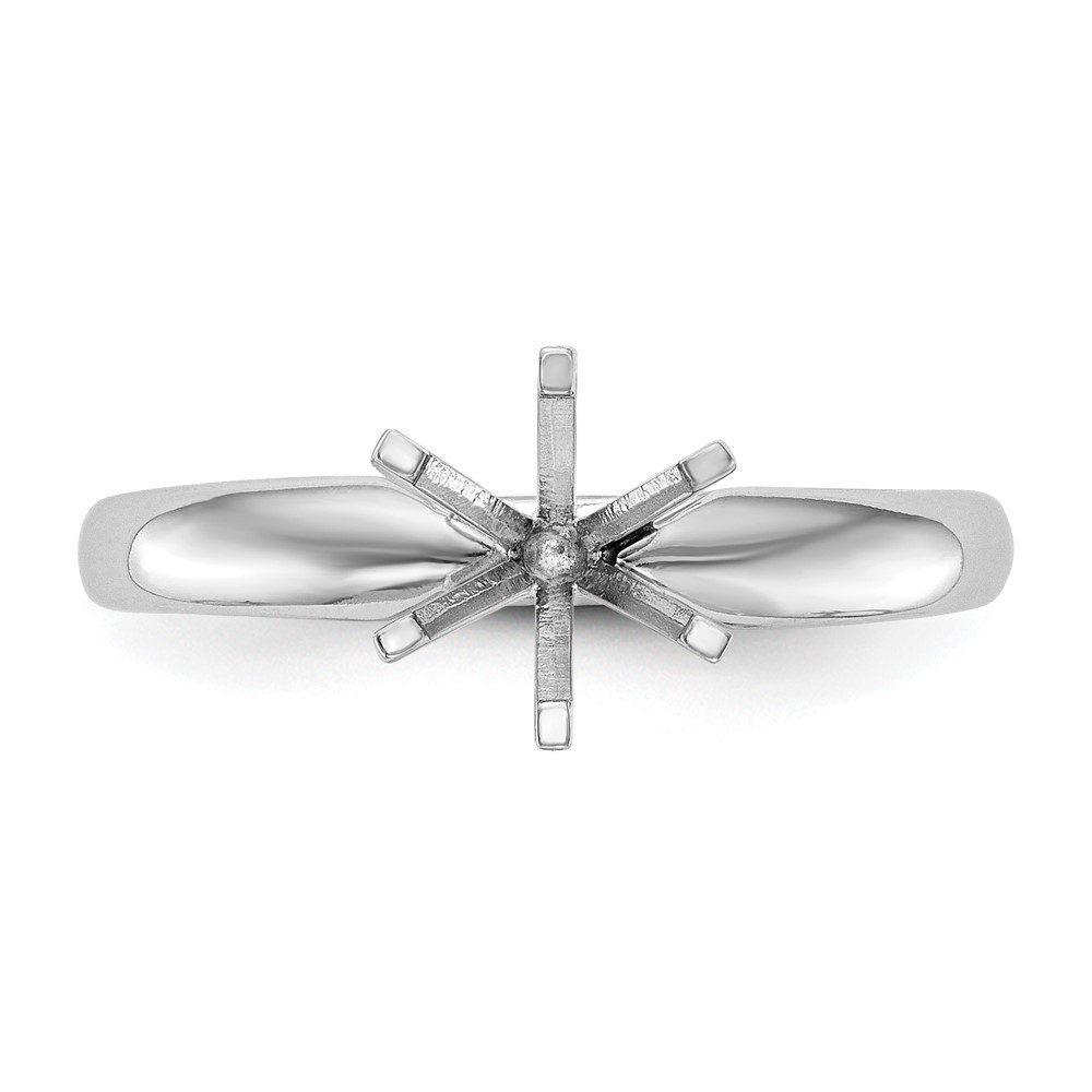 Top view of a silver ring with a star-shaped design.