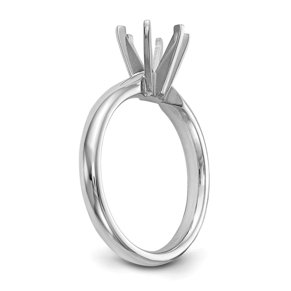 Silver ring setting for a gemstone, shown from a side angle.
