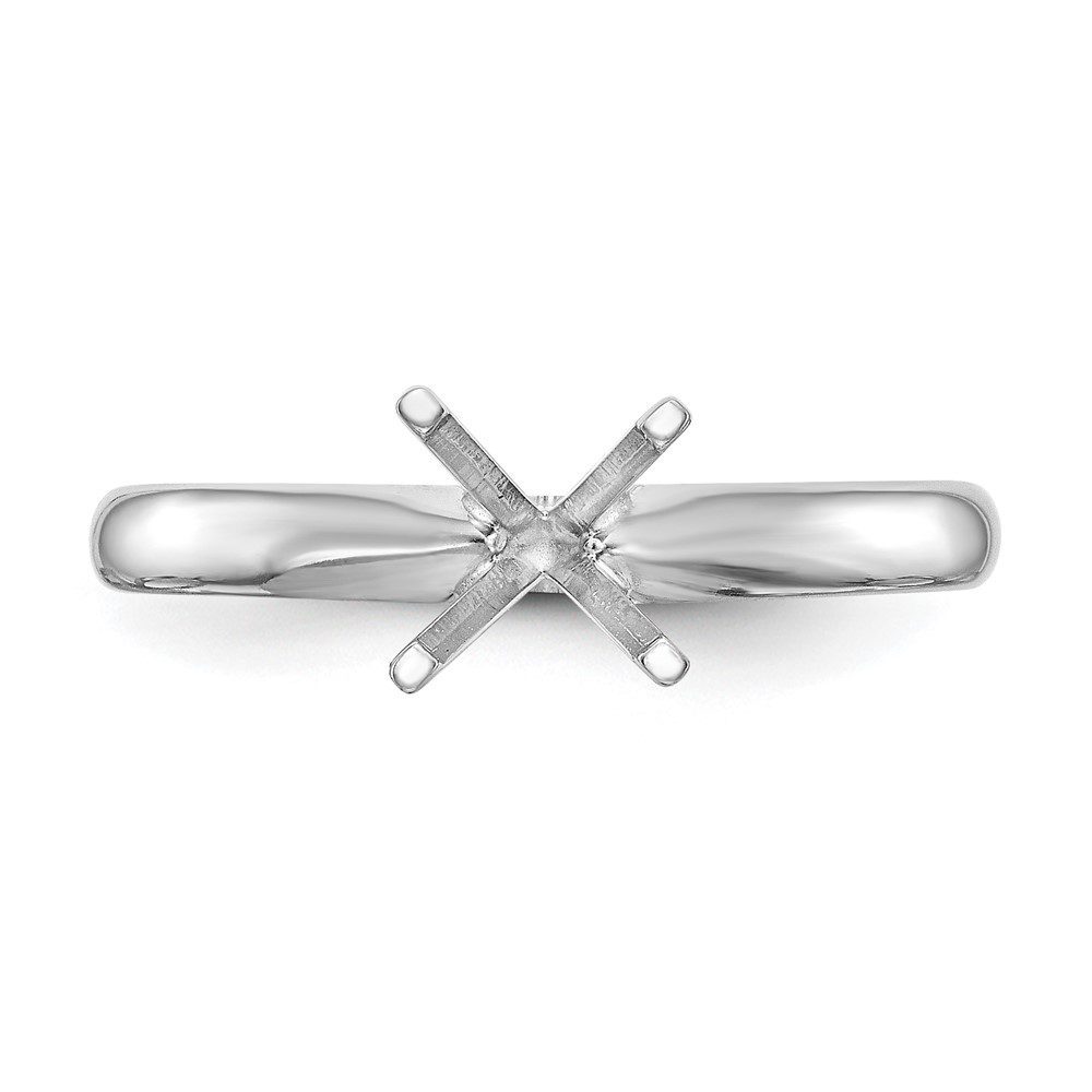 Silver ring setting without a gemstone.