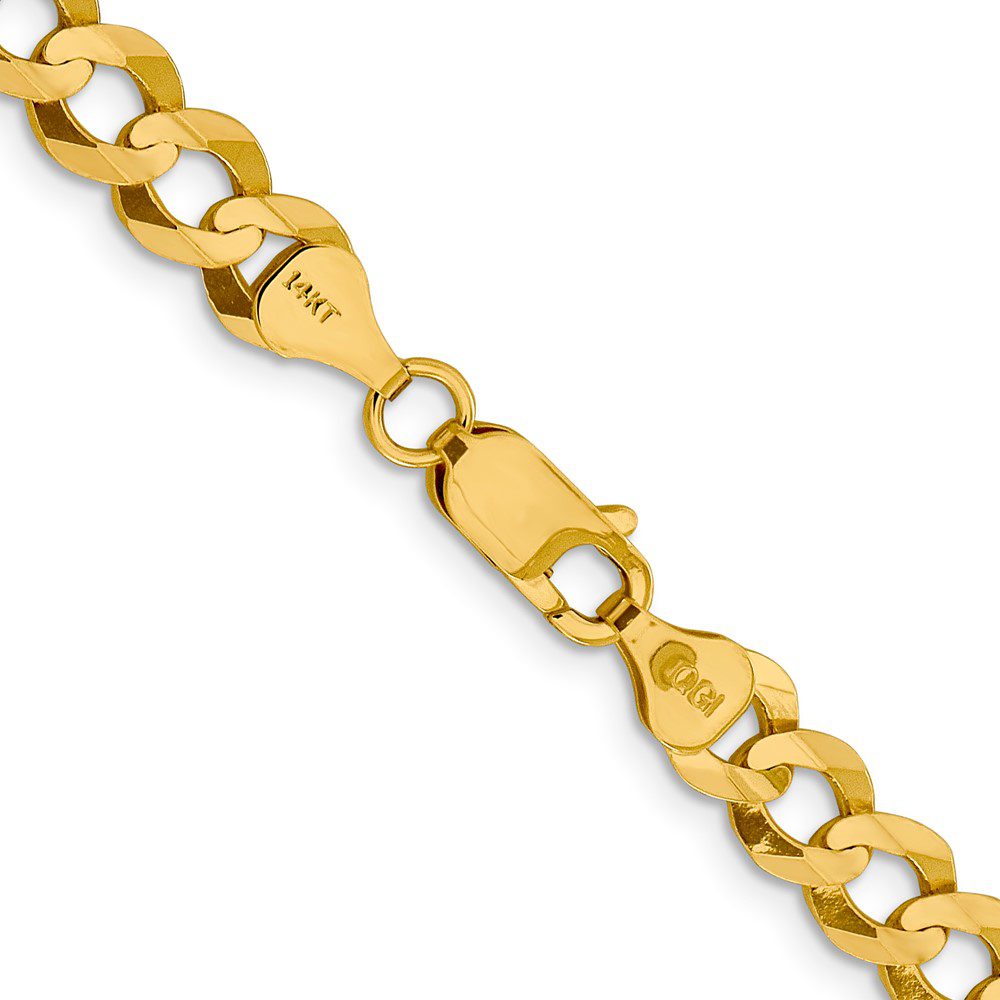 Close-up of a gold chain bracelet with a lobster clasp.