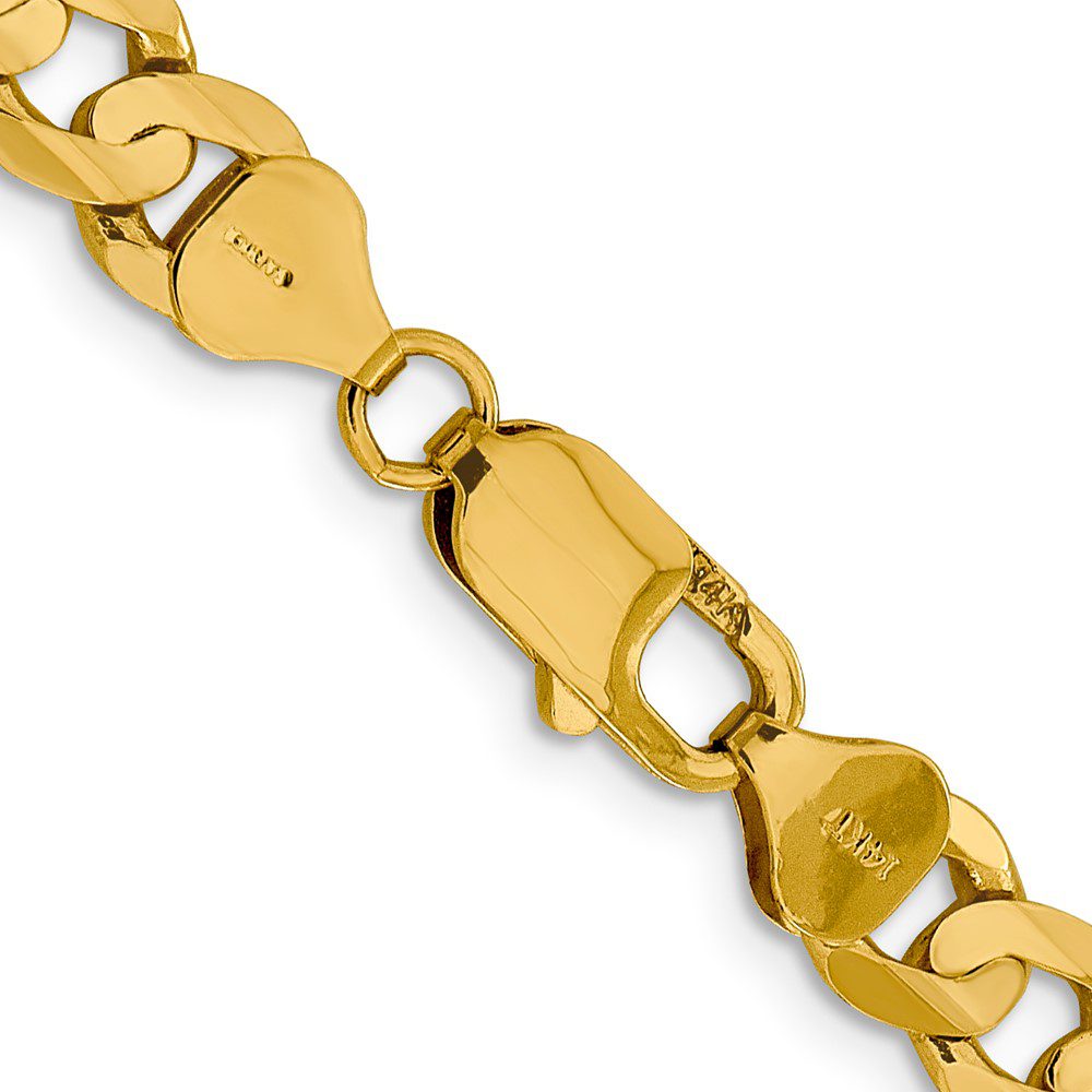 Close-up of a gold chain bracelet with intricate links.