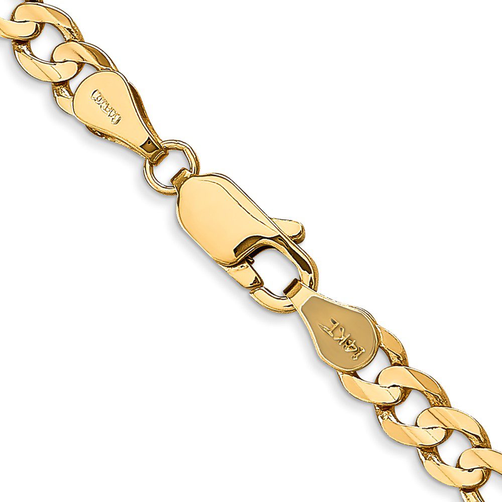 Close-up of a gold chain bracelet with a clasp.