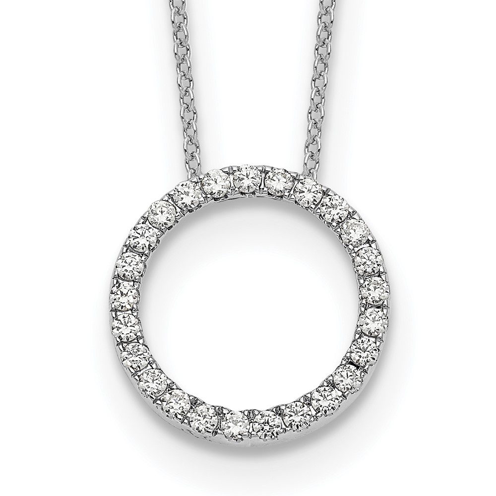 Elegant silver necklace with a diamond-studded circular pendant.