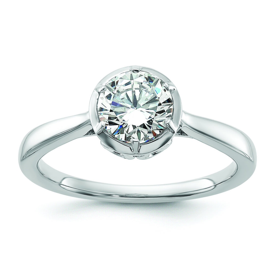 Elegant silver ring with a sparkling round diamond.