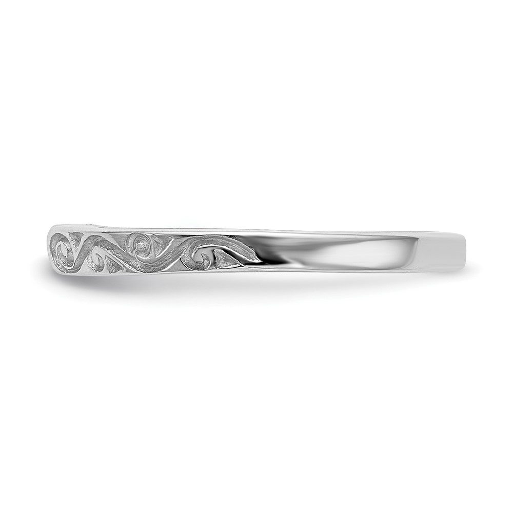 Elegant silver ring with intricate floral engravings.