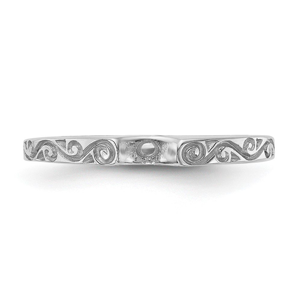 Elegant silver bracelet with intricate scrollwork design.