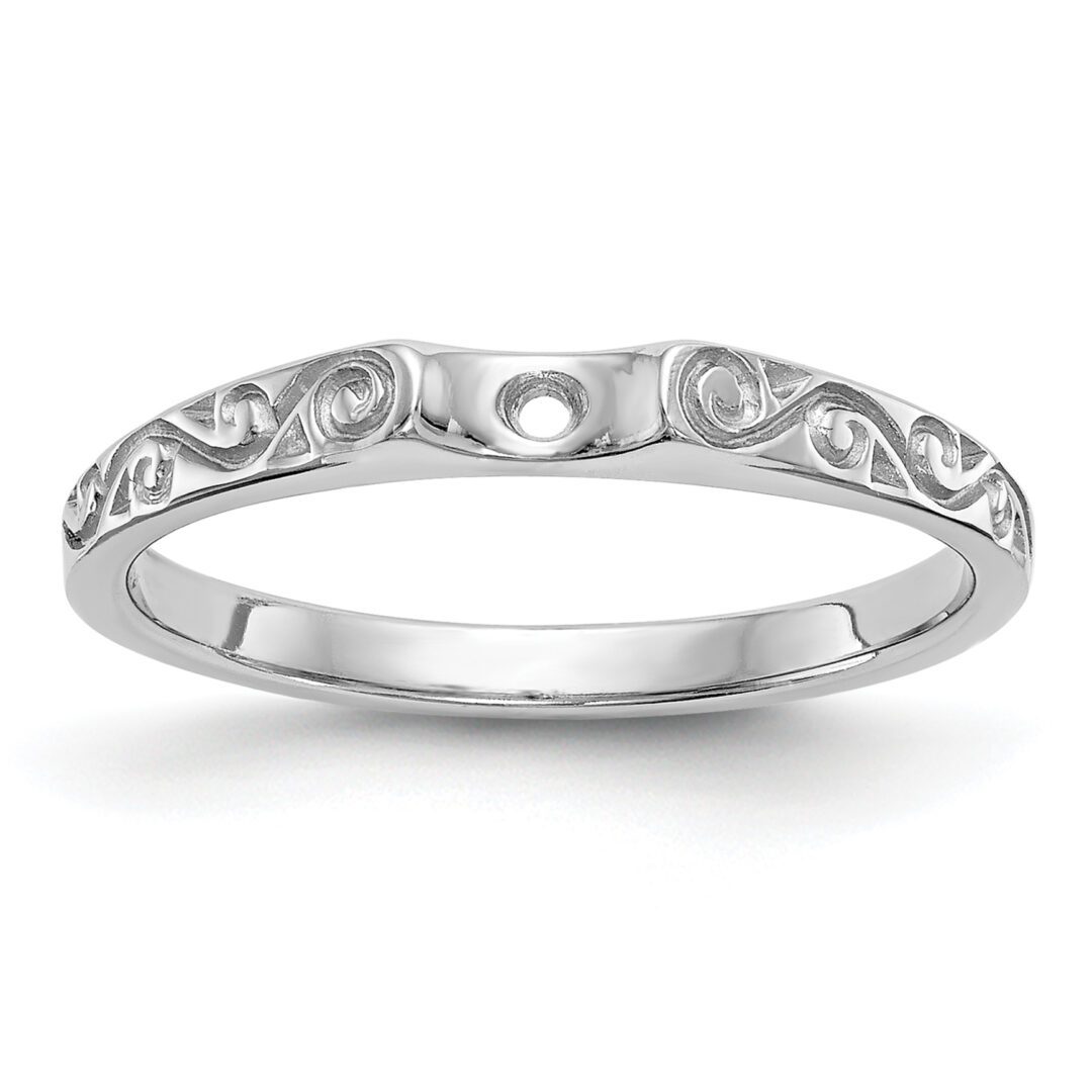 Elegant silver ring with intricate floral engravings.