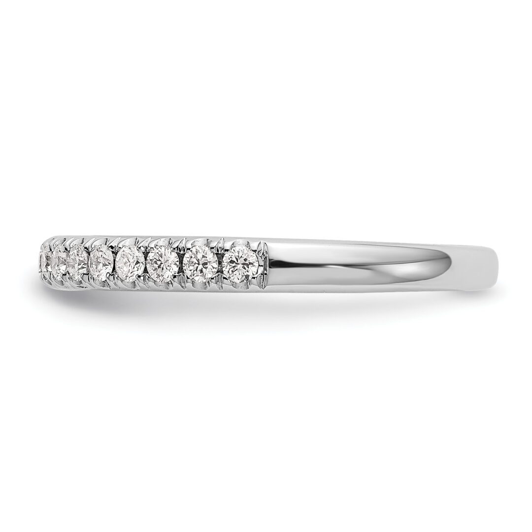 Elegant silver ring with a row of sparkling diamonds.