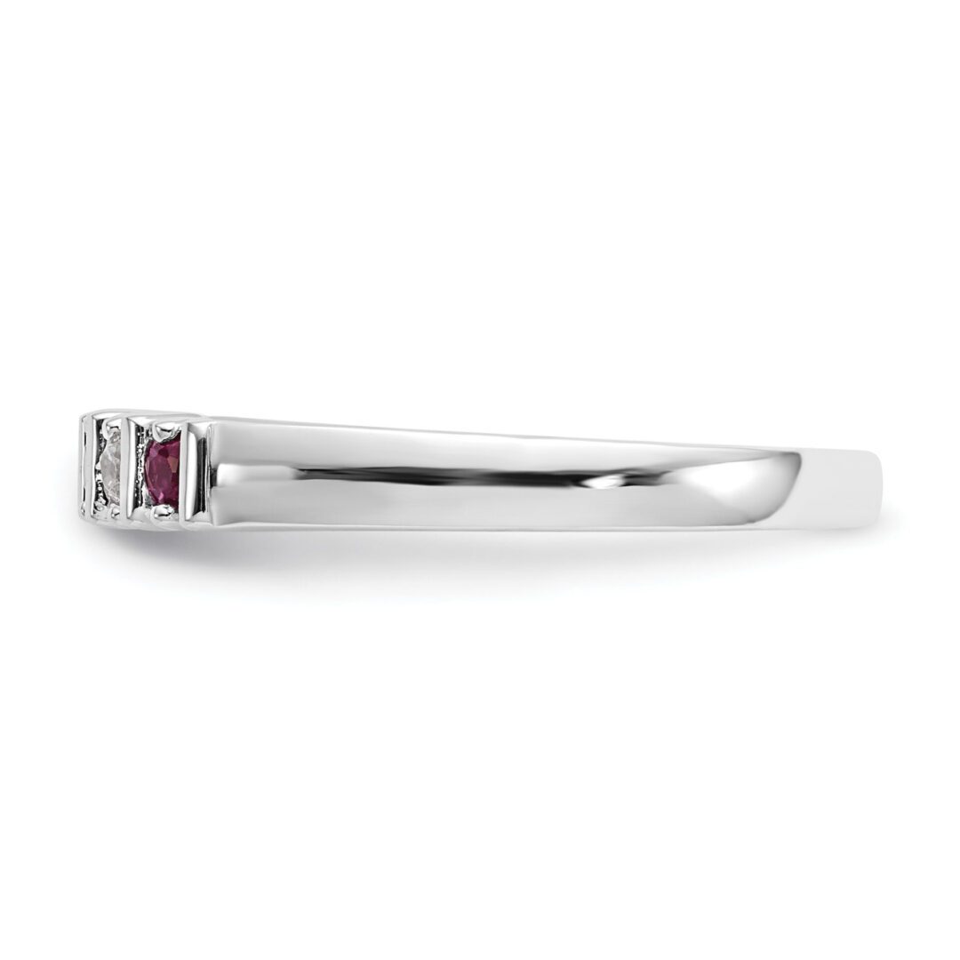 Elegant silver ring with three rectangular red stones.