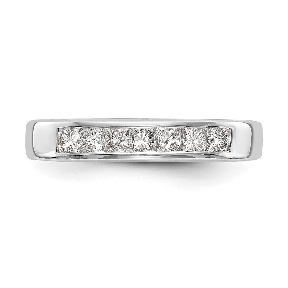 Elegant silver ring with five sparkling diamonds in a row.