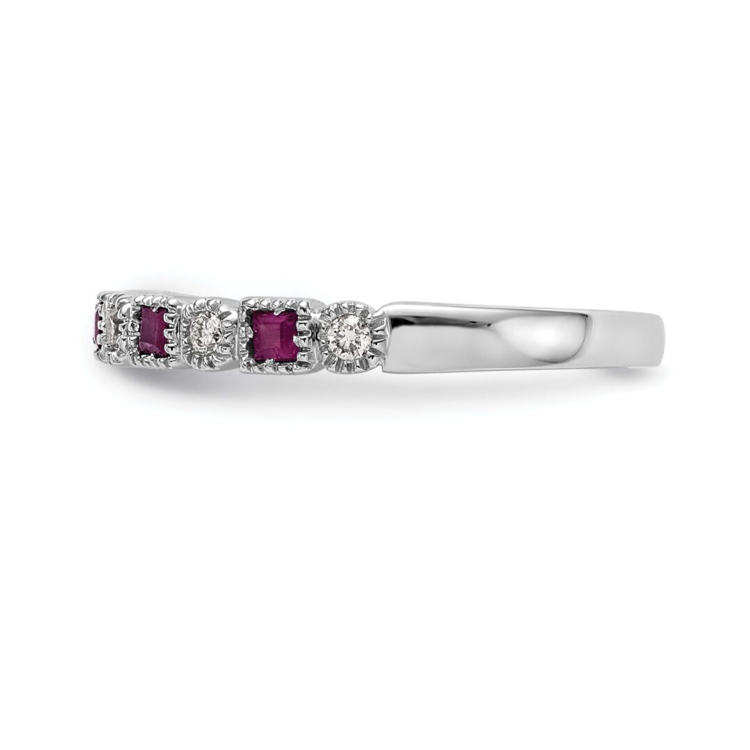 Elegant silver ring with alternating diamonds and rubies.