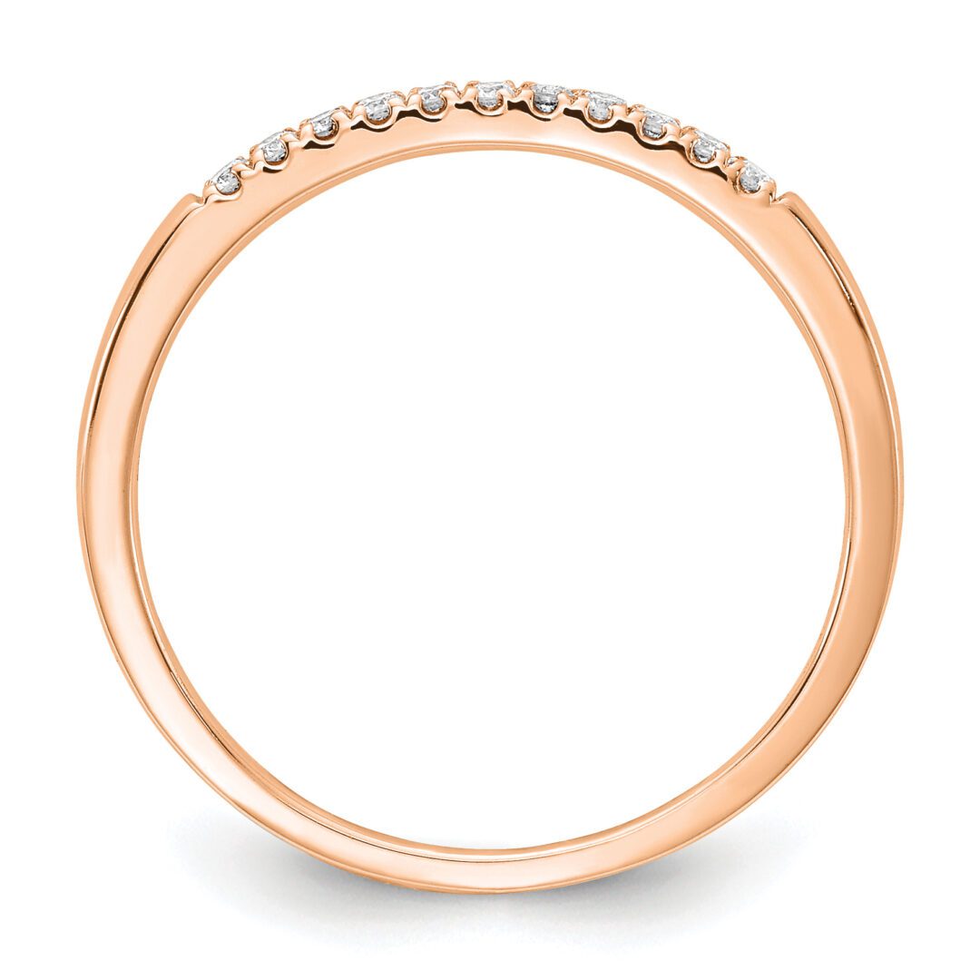 Elegant rose gold ring with small diamonds on top.