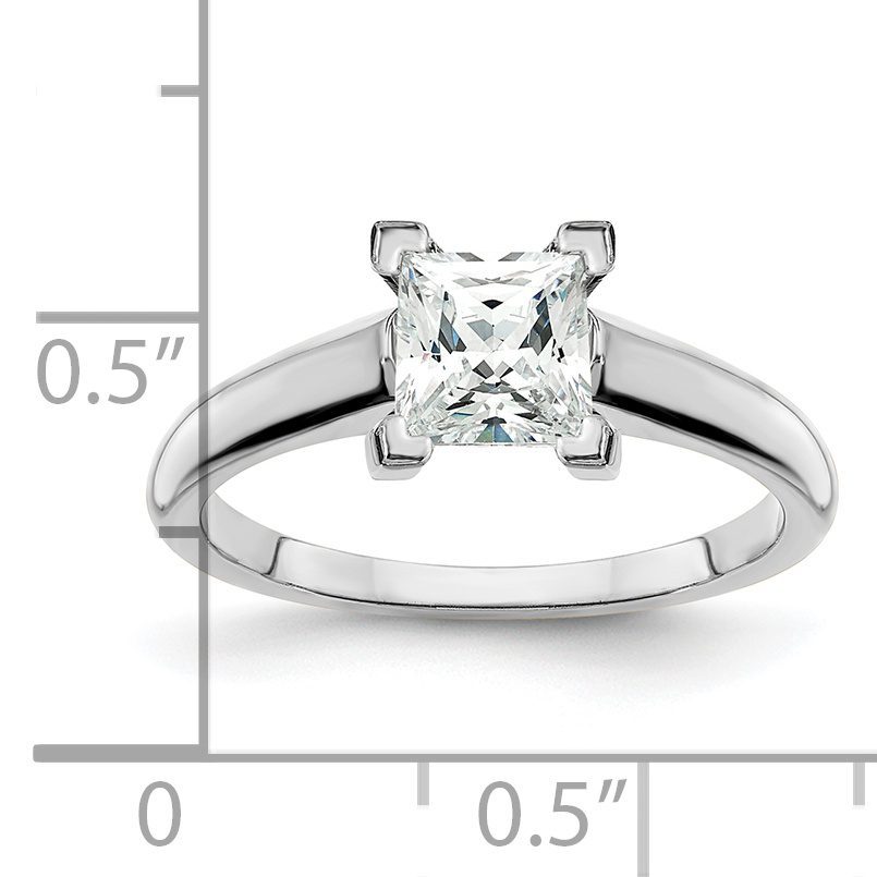 A silver ring featuring a square-cut solitaire diamond.