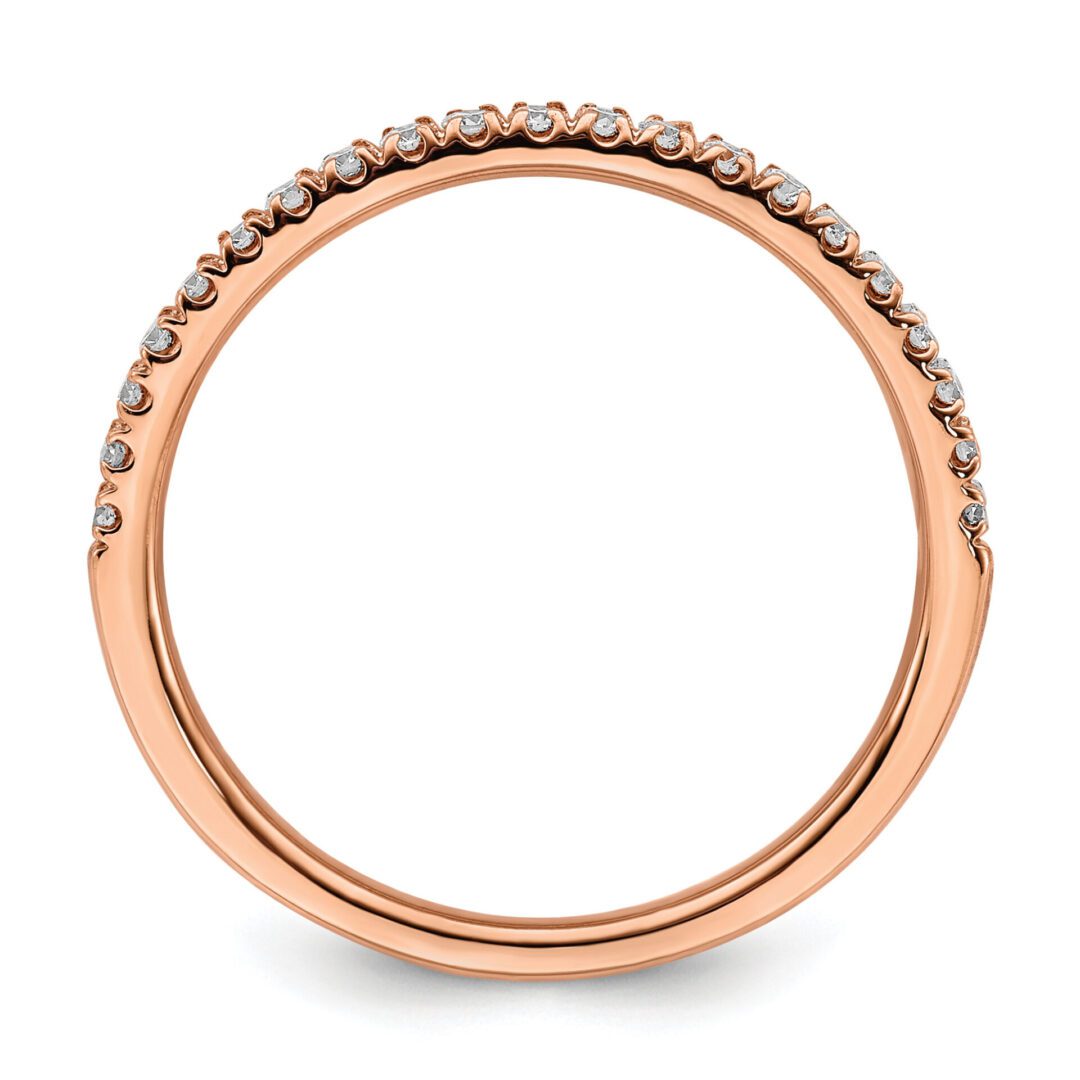 Elegant rose gold ring with a row of small diamonds.
